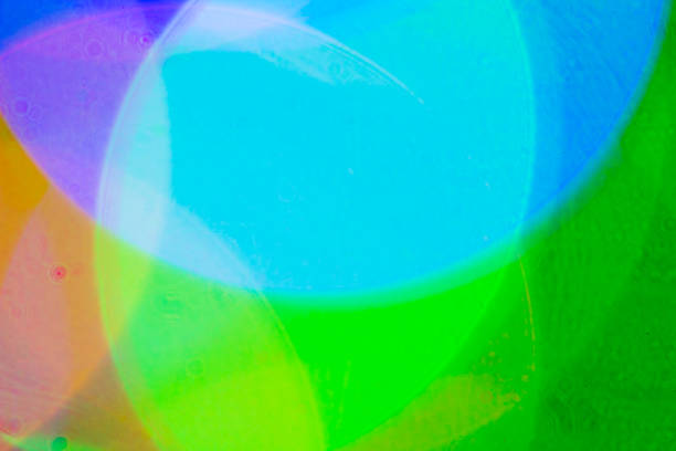 istock Blurred and defocused abstract multicolor background with christmas lights, soft multicolored bokeh circles 889146888
