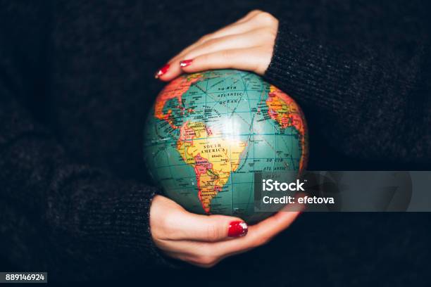 Womans Hands Holding Earth Stock Photo - Download Image Now - Globe - Navigational Equipment, Women, Planet - Space