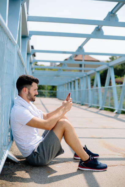 istock Young sportsman exercising 889147082