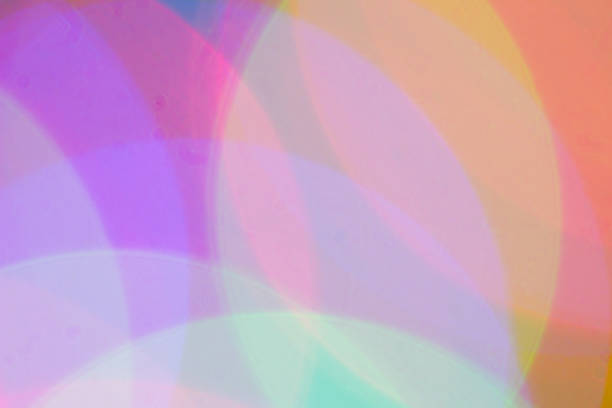 istock Blurred and defocused abstract multicolor background with christmas lights, soft multicolored bokeh circles 889147198