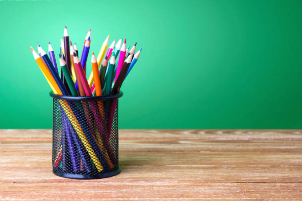 istock Pencils on a wooden table 889151856