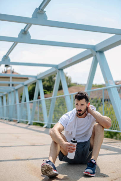 istock Young sportsman exercising 889155024