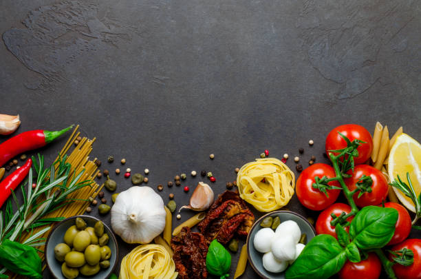 istock Italian food on a dark background with copy space, ingredients f 889155302
