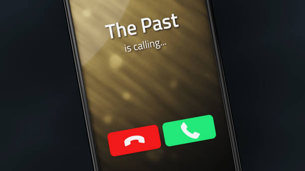 The Past is Calling Incoming call from The Past on a smartphone answering photos stock pictures, royalty-free photos & images
