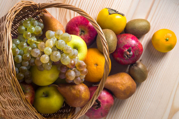 istock Composition with assorted fruits in wicker basket, healthy life 889160352