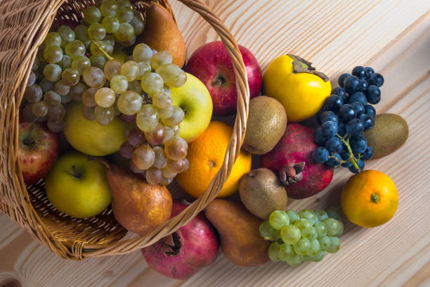istock Composition with assorted fruits in wicker basket, healthy life 889160408