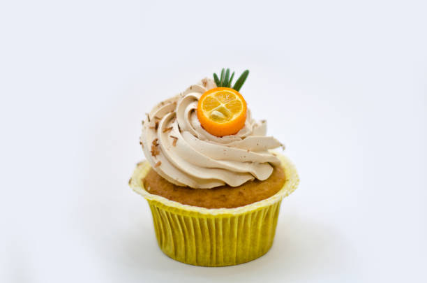 istock cupcake with cumquat decoration isolated 889165678