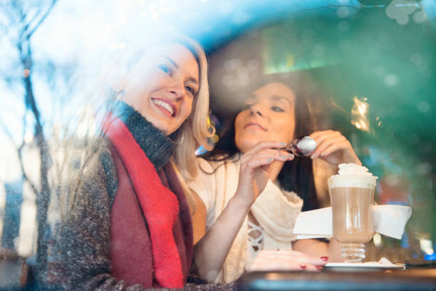 istock Christmas Shopping with two young women 889173578