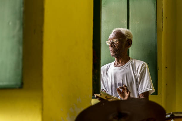 istock Brazilian senior playing Samba at home 889174000