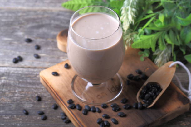 istock Black beans and black soybean milk 889176366
