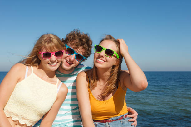 istock Group friends boy two girls having fun outdoor 889177004