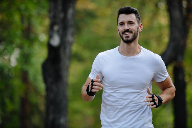 istock Young sportsman training in nature 889182256