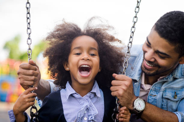 istock Daughter and father at the park. 889185218