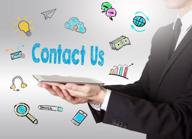 istock Contact Us concept, young man holding a tablet computer 889195664