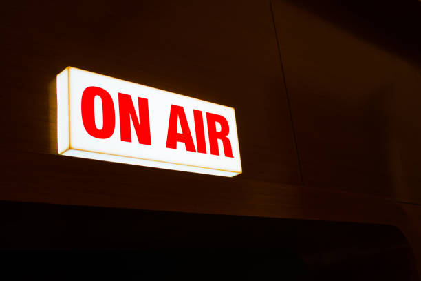 istock On Air studio sign on light box and red alphabet. Live studio concept. 889204650