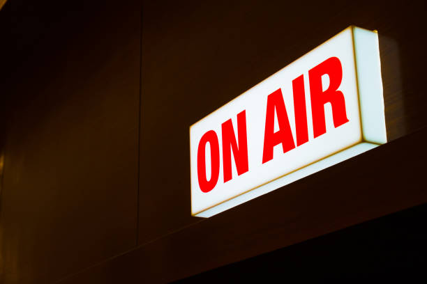 istock On Air studio sign on light box and red alphabet. Live studio concept. 889204656