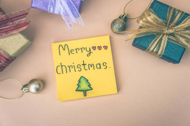 istock christmas background  and paper note merry christmas decor on background 889209094
