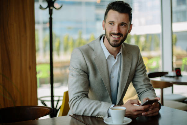 istock Young businessman in cafe bar 889231308