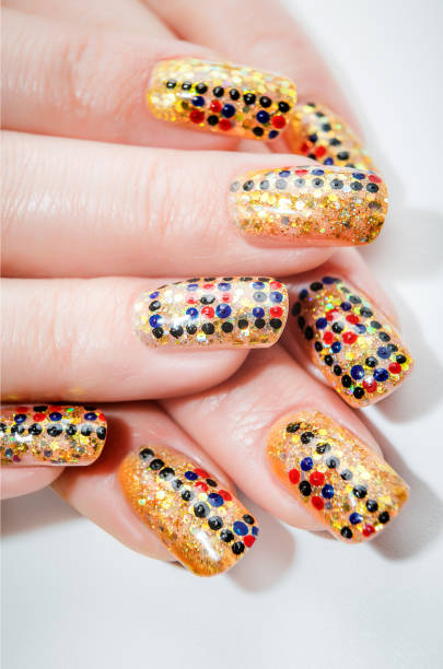 istock Female hands with nails art on the white background 889253030