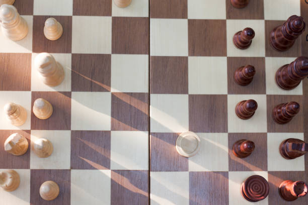 istock chess Board and chess pieces, Wooden chess pieces on a chess Board . 889299582
