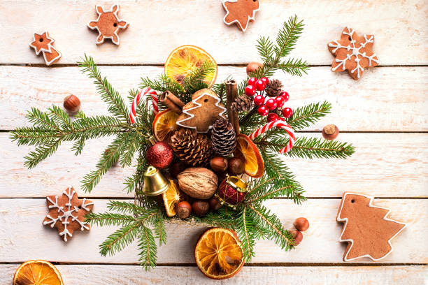 istock Christmas decorations on a white wooden  table 889307138