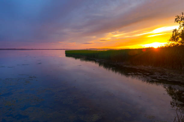 istock Beautiful colorful sunset over the lake 889309934