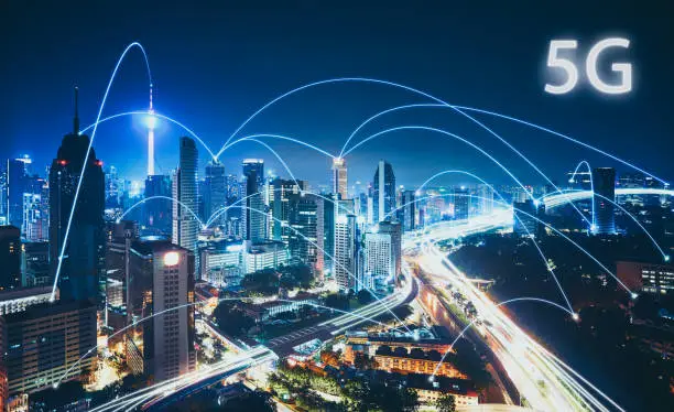 Photo of 5G network wireless systems and internet of things with modern city skyline. Smart city and communication network concept .