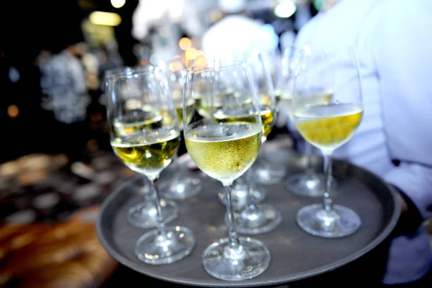 istock glasses with champagne and wine 889326062