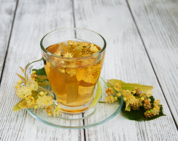istock cup of herbal tea with linden flowers 889326464