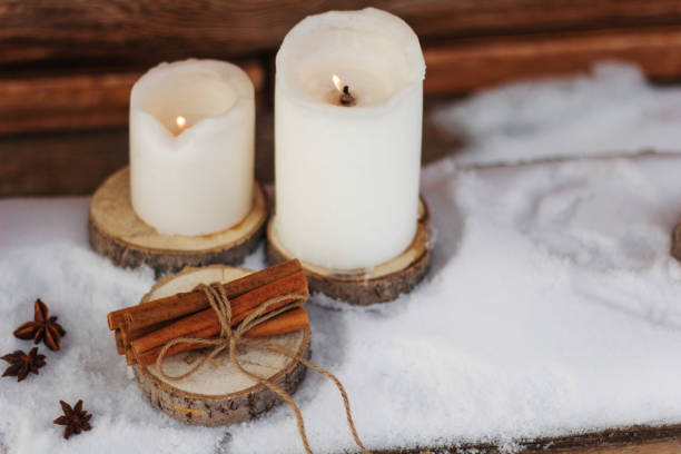 istock white candles dried cinnamon sticks and anise stars 889326624