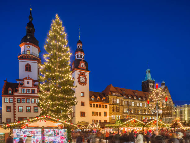 Christmas Market Chemnitz (Saxony) View over the Chemnitzer Christmas Market, located at the Neumarkt in front of the landmark Old / New Town Hall (double town hall), illuminted on a clear winter night. erzgebirge stock pictures, royalty-free photos & images