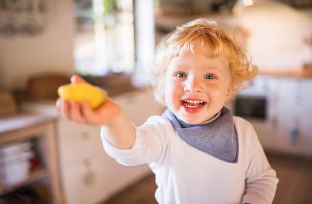 istock Toddler boy in the kitchen. 889362754