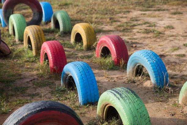 old tire paint colorful for kids play in the school of Mae Chaem is a district of Chiang Mai Province in northern Thailand.