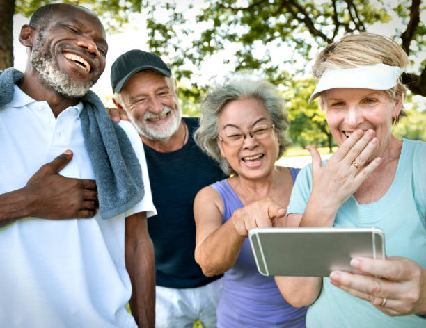 istock Seniors laughing at something on the phone 889408174