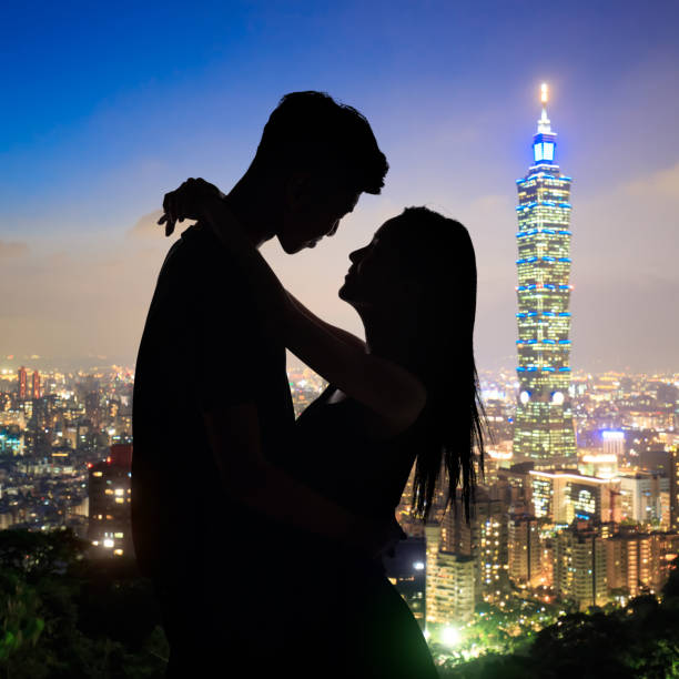 istock silhouette of couple 889408758