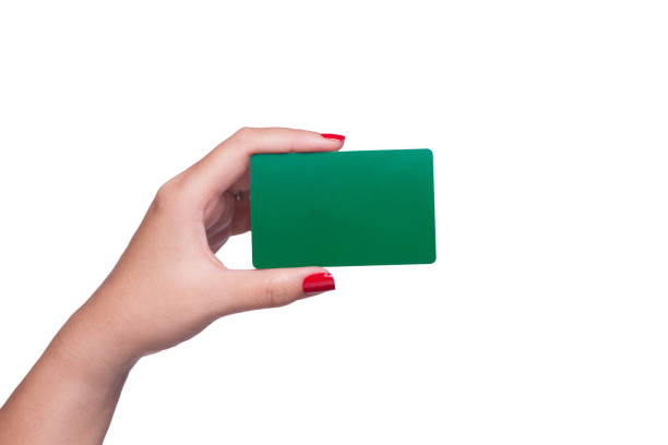 istock Female hand holding blank green card isolated on white background. 889408994