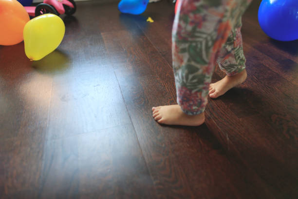istock Little girls having fun at home 889417902