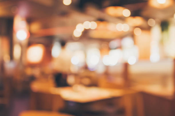 istock Restaurant cafe or coffee shop interior with people abstract blur background 889418000