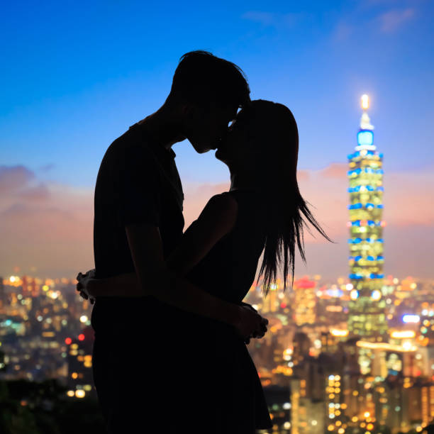 istock silhouette of couple 889418878