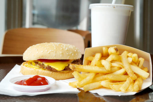 istock Cheeseburger and french fries 889421214
