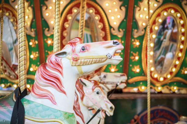 istock Carousel, merry go round, at Christmas funfair 889440680