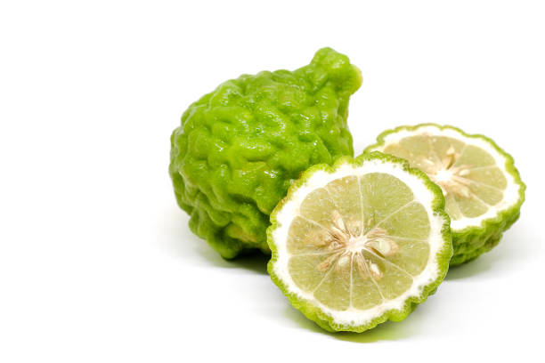 istock Fresh Green Bergamot or Leech Lime fruit slice on white background 889446506