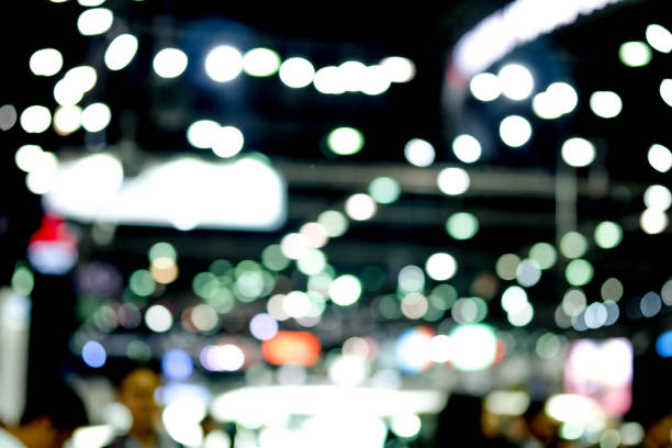 istock Abstract background blurred Lighting in the exhibition event. 889446520