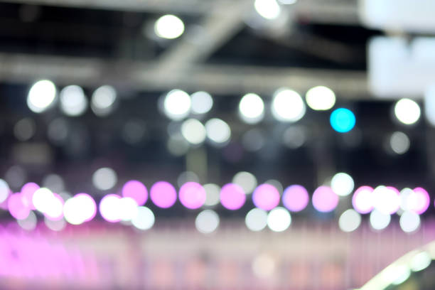 istock Abstract background blurred Lighting in the exhibition event. 889446544