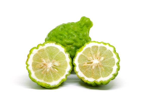 istock Fresh Green Bergamot or Leech Lime fruit slice on white background 889446596