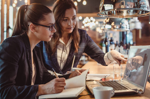 Businesswomen Working in The Cafeteria