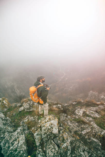 istock Photographer on the mountain 889463532