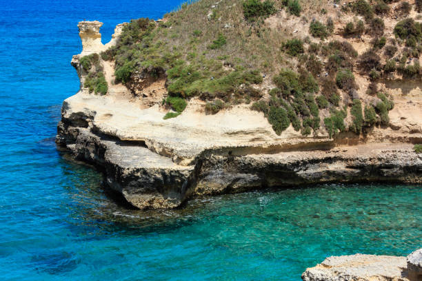 istock Grotta dello Mbruficu, Salento sea coast, Italy 889464004