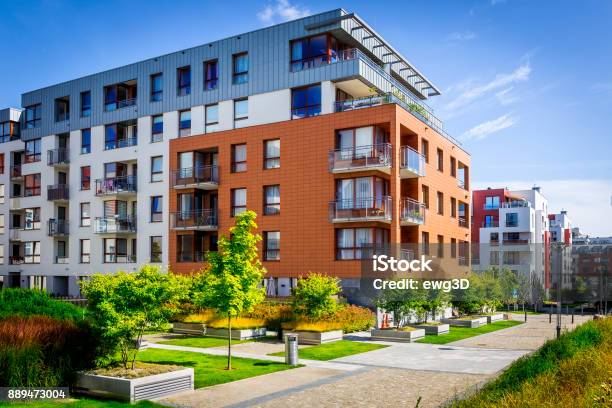 Walkway Leading Along The New Colorful Cmplex Of Apartment Buildings Stock Photo - Download Image Now