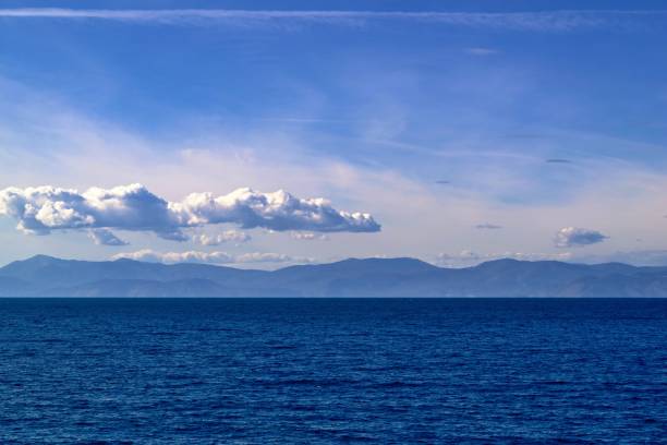istock sea landscape with mountains 889495322